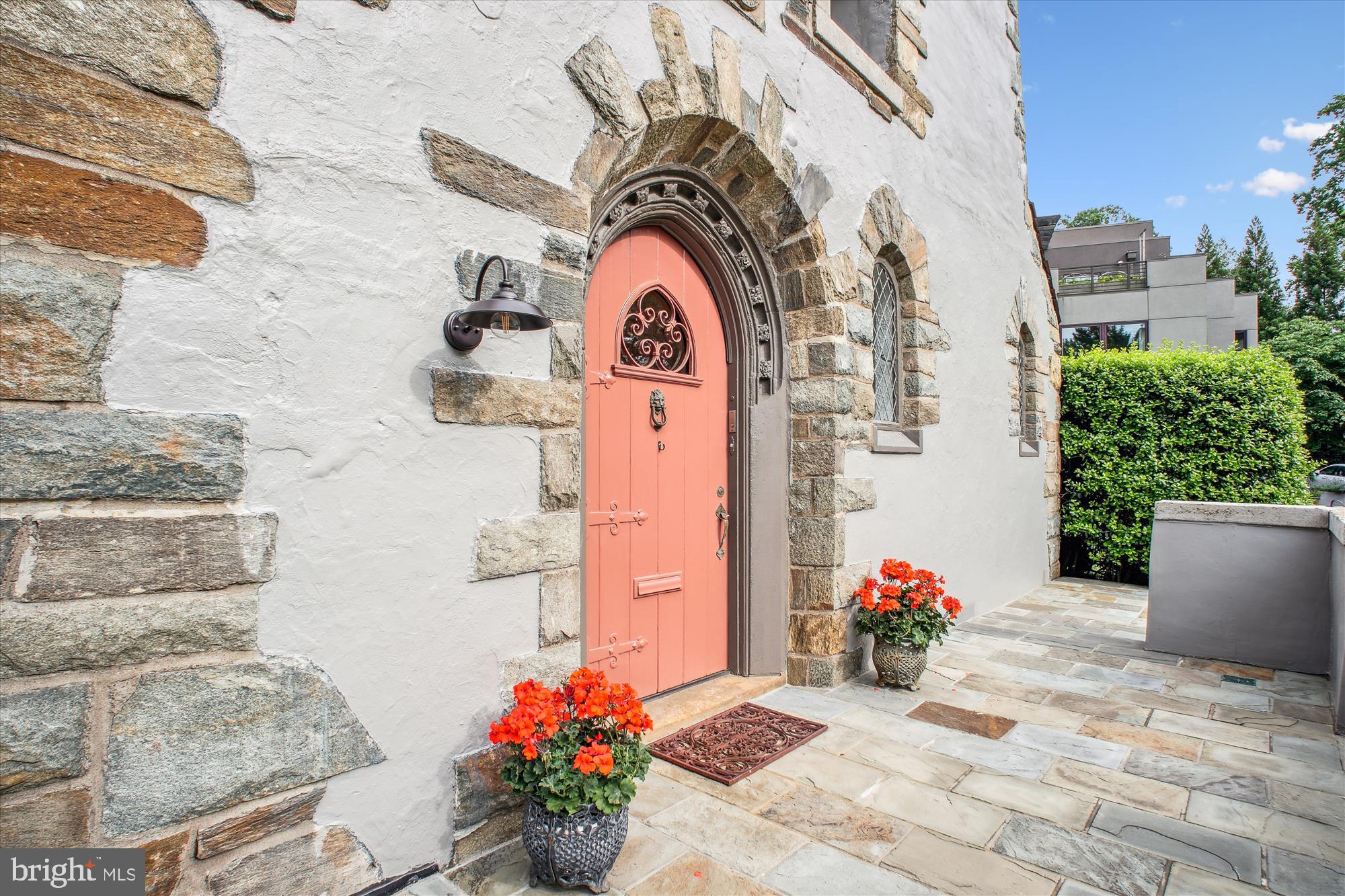 302 Ellsworth Drive Silver Spring, MD 20910 - Photo 4 of 64 a front view of a house with a garden