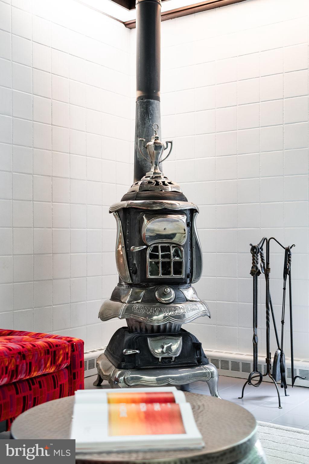 302 Ellsworth Drive Silver Spring, MD 20910 - Photo 42 of 64 a kitchen with a stove and cabinets