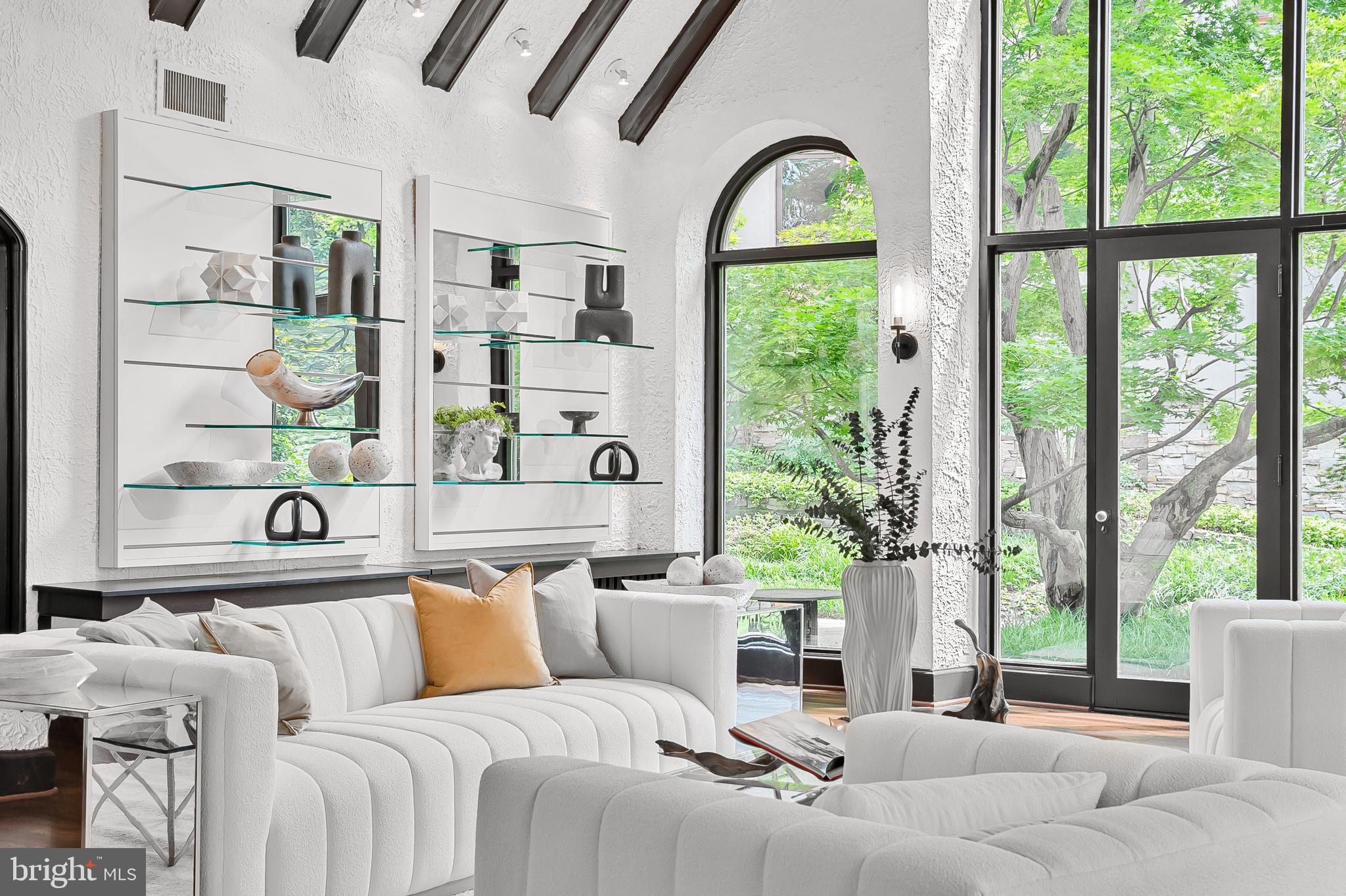 302 Ellsworth Drive Silver Spring, MD 20910 - Photo 5 of 64 a living room with furniture and a large window