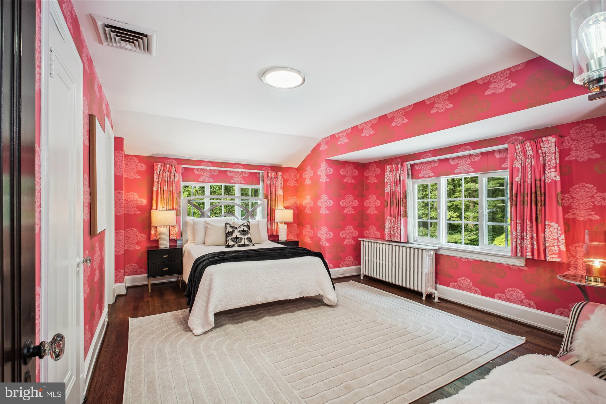 302 Ellsworth Drive Silver Spring, MD 20910 - Photo 51 of 64 a spacious bedroom with a bed and a window