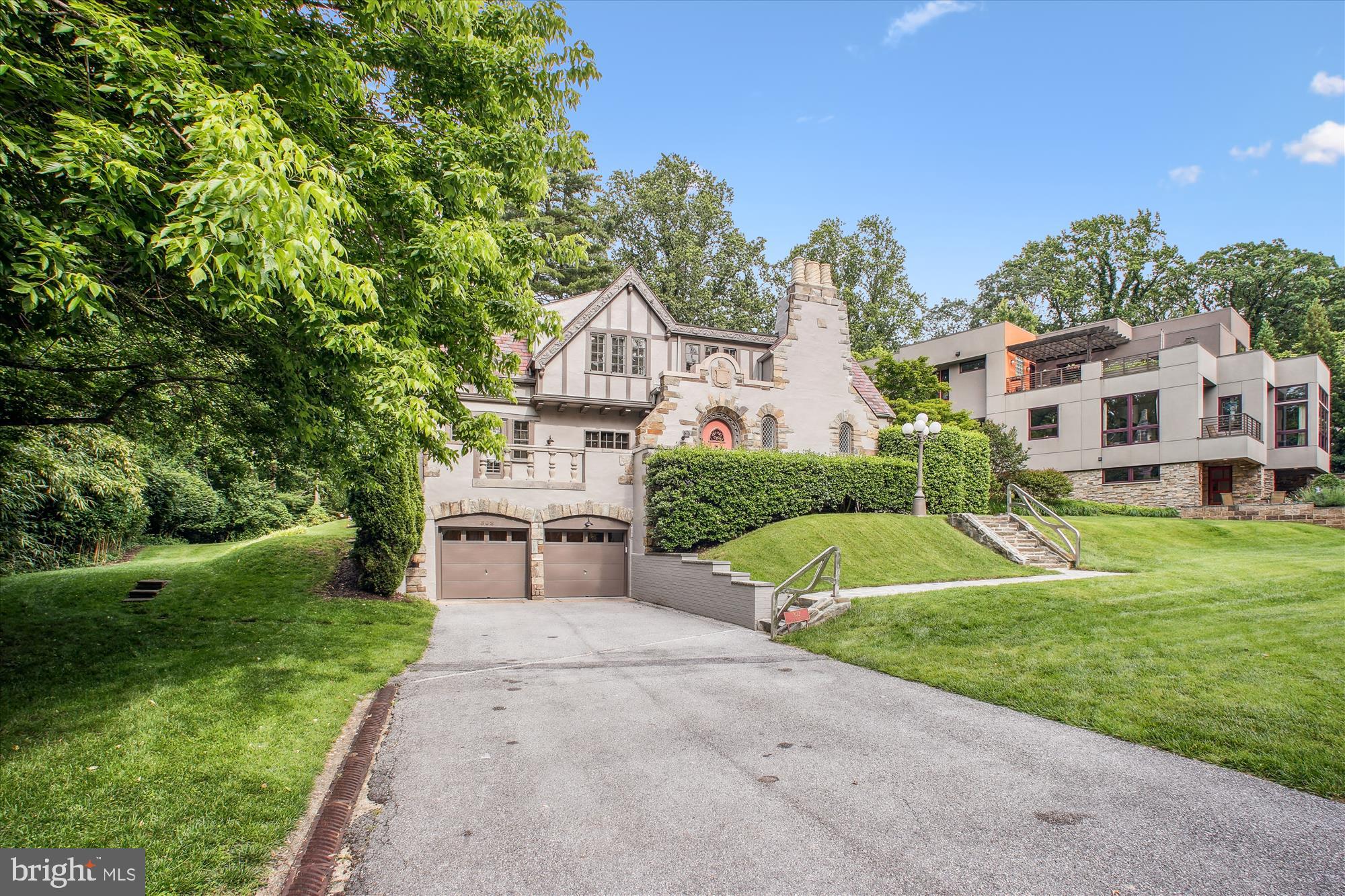 302 Ellsworth Drive Silver Spring, MD 20910 - Photo 55 of 64 a view of a house with a big yard plants and large trees