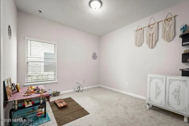 a room with furniture and a window