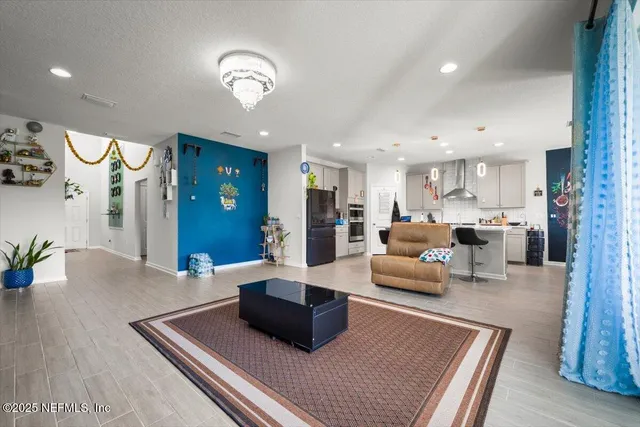 a kitchen with a sink cabinets and window