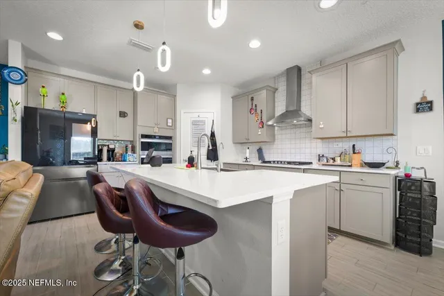 a view of kitchen with dining table and chairs