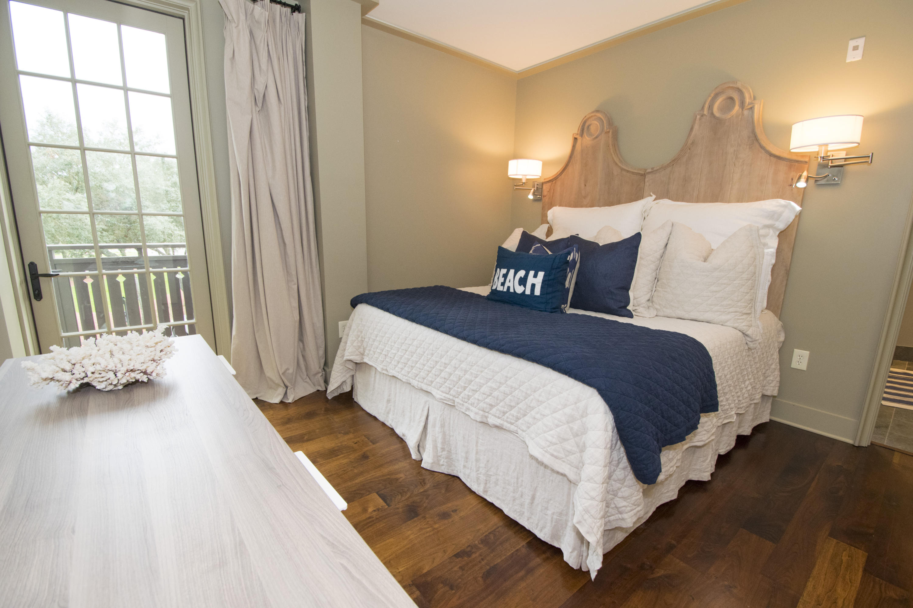 78 North Barrett Square, Unit 2 Rosemary Beach, FL 32461 - Photo 16 of 27 a bedroom with bed and a window