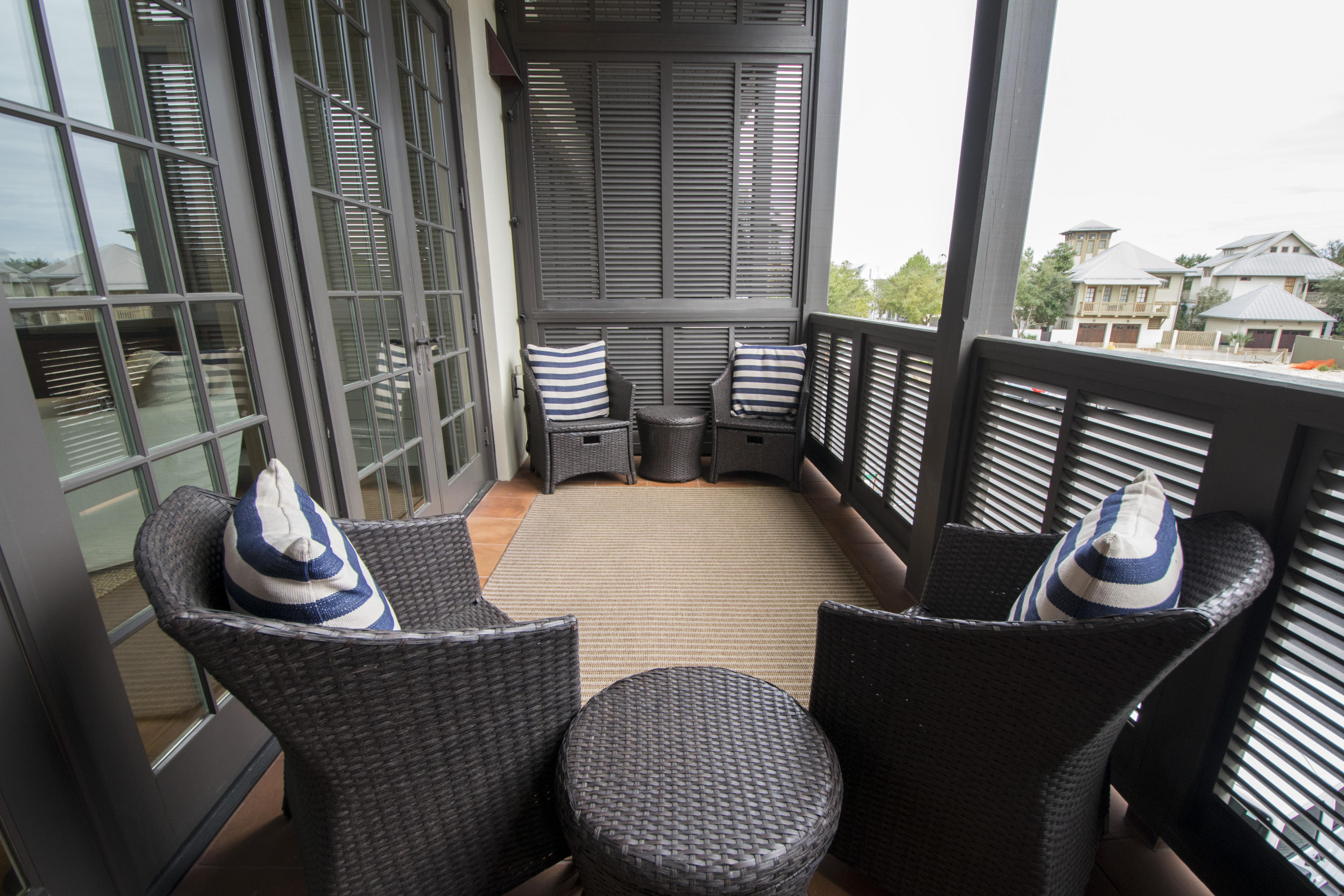 78 North Barrett Square, Unit 2 Rosemary Beach, FL 32461 - Photo 20 of 27 a view of a dining room with furniture window and outside view
