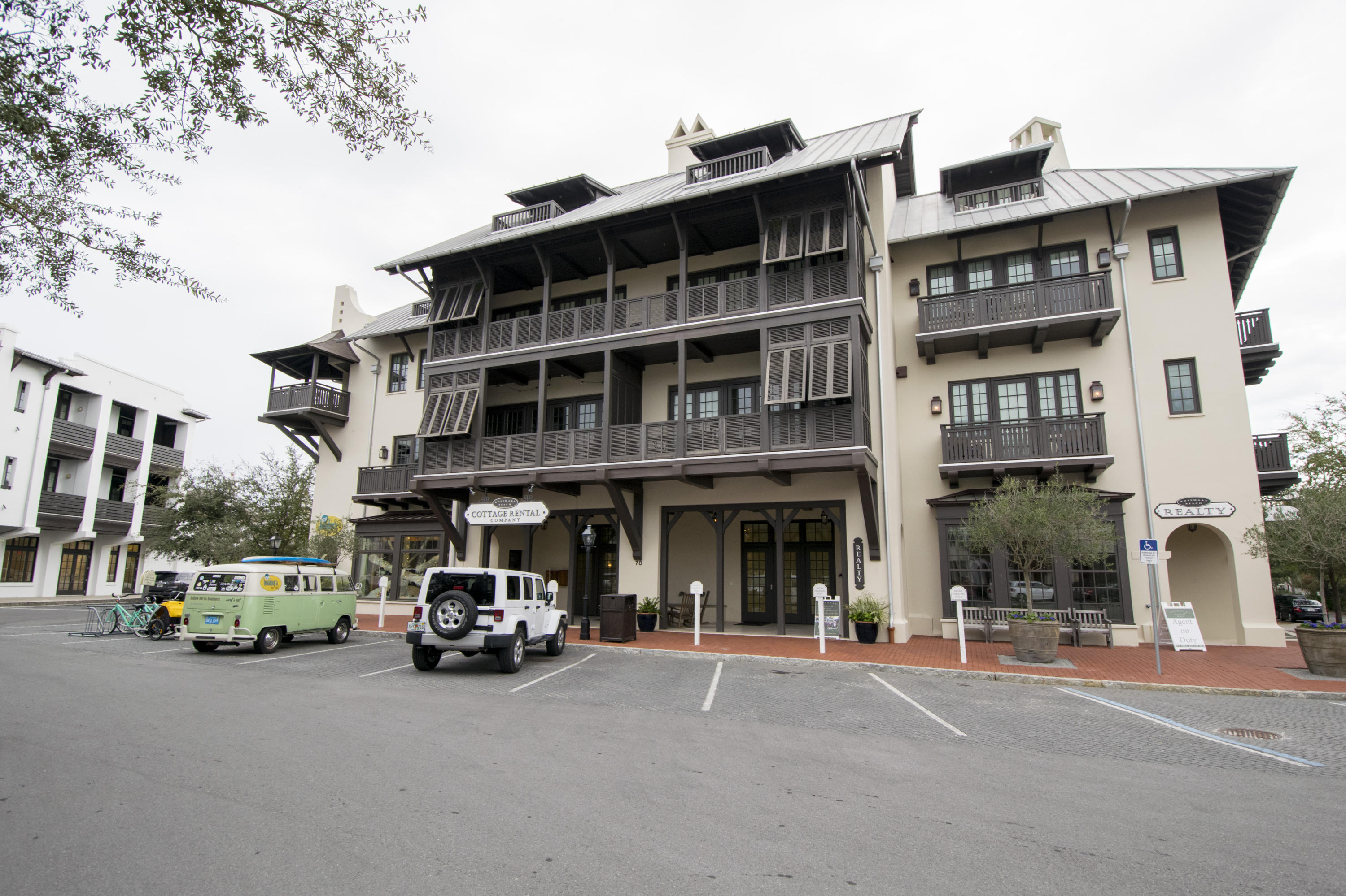 78 North Barrett Square, Unit 2 Rosemary Beach, FL 32461 - Photo 27 of 27 a couple of cars parked in front of building