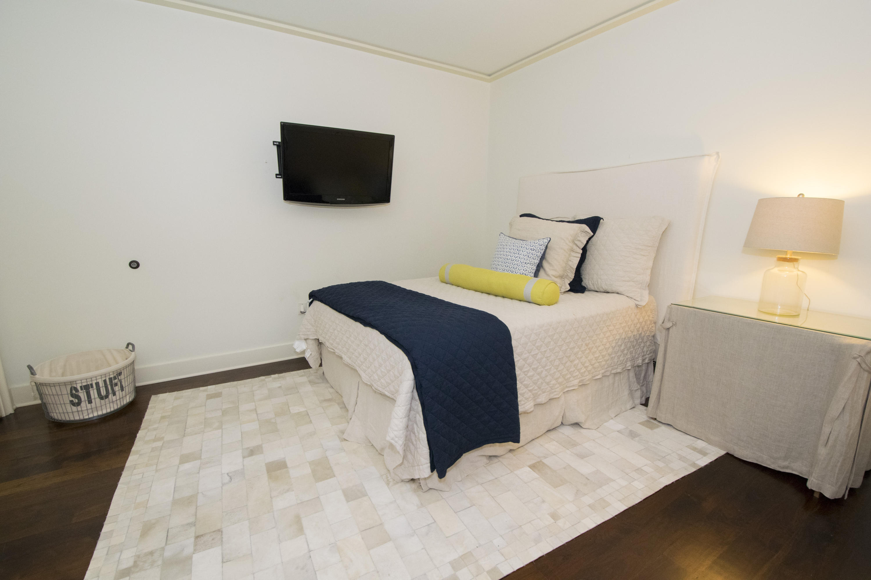78 North Barrett Square, Unit 2 Rosemary Beach, FL 32461 - Photo 9 of 27 a bedroom with a bed and a television