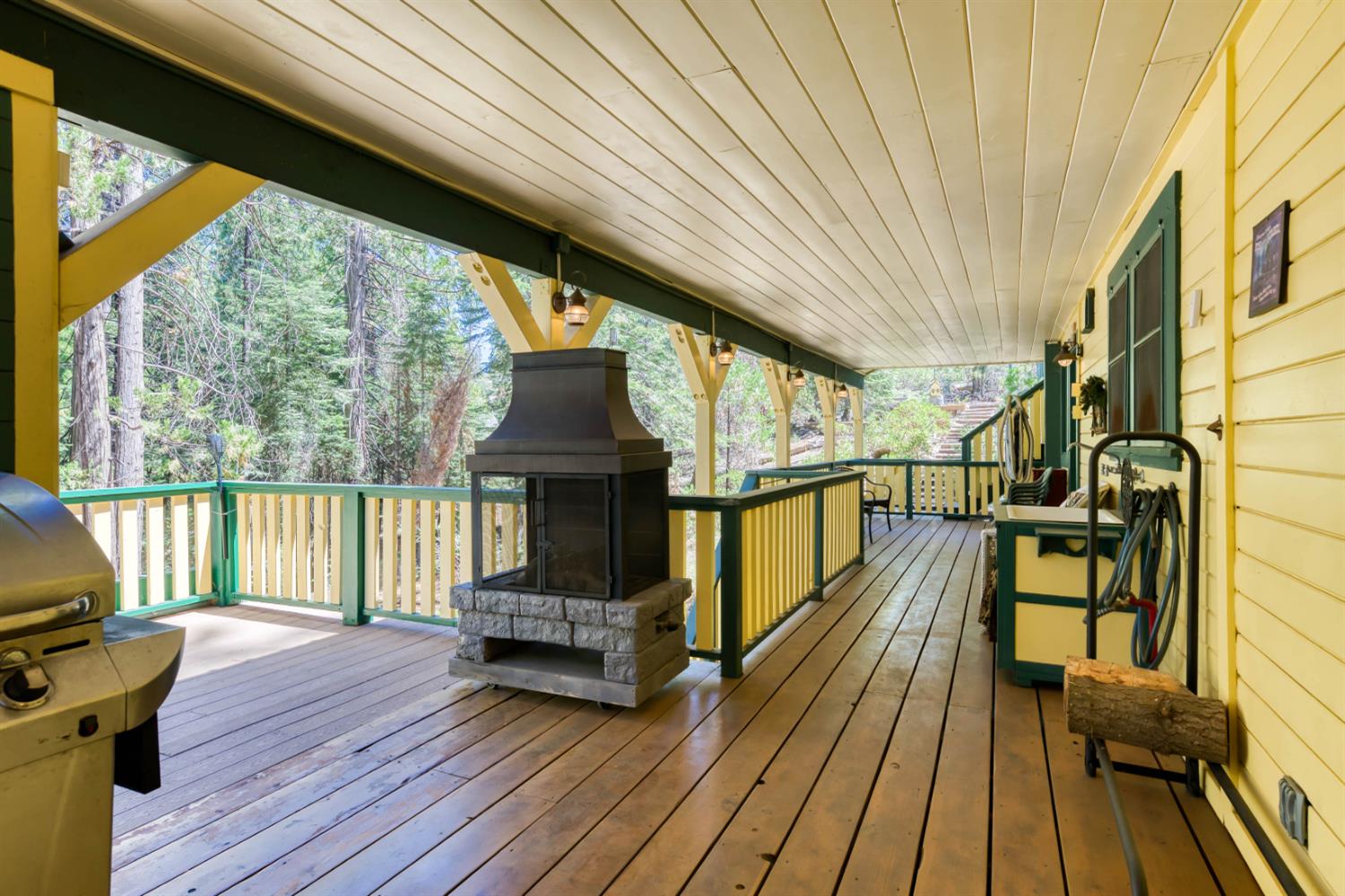 42025 Tollhouse Road Shaver Lake, CA 93664 - Photo 6 of 64 a view of balcony with wooden floor and outdoor seating