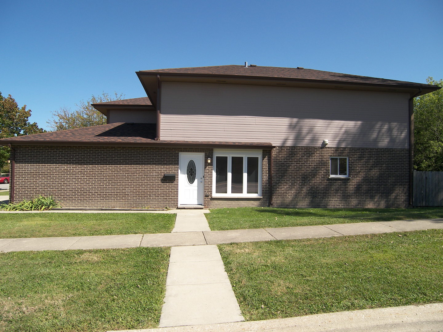 615 Terry Court Roselle, IL 60172 - Photo 3 of 15 a front view of a house with a yard