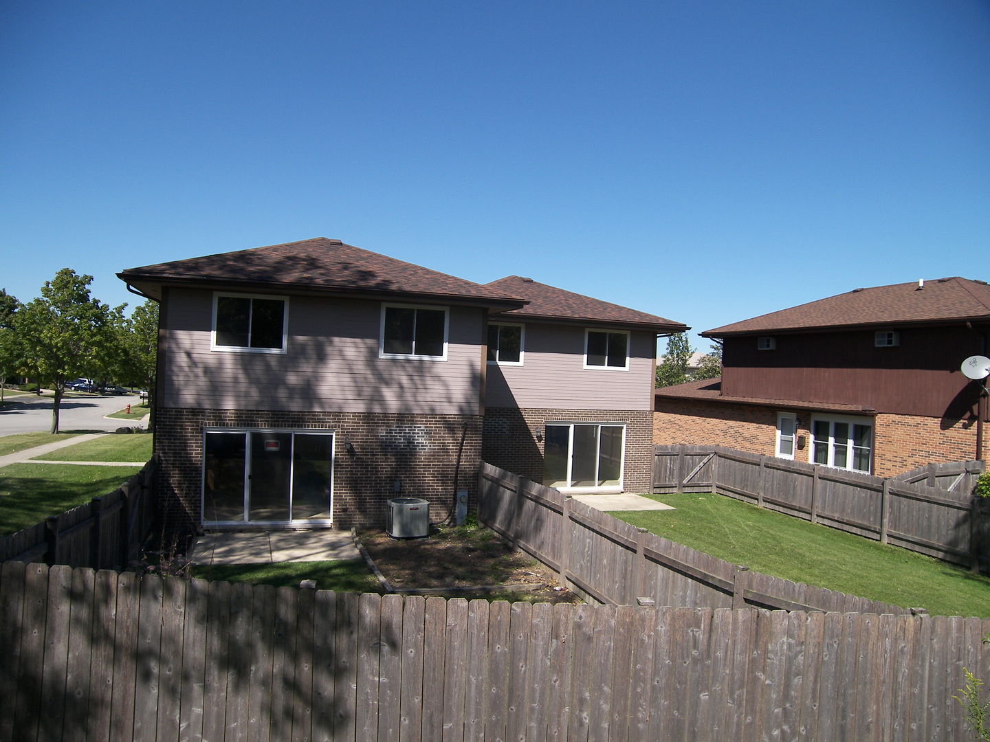 615 Terry Court Roselle, IL 60172 - Photo 4 of 15 a front view of a house with a yard