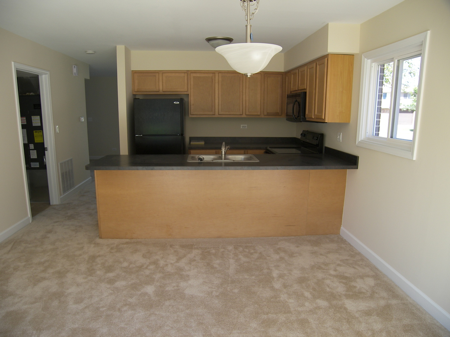 615 Terry Court Roselle, IL 60172 - Photo 8 of 15 a view of a kitchen with a sink