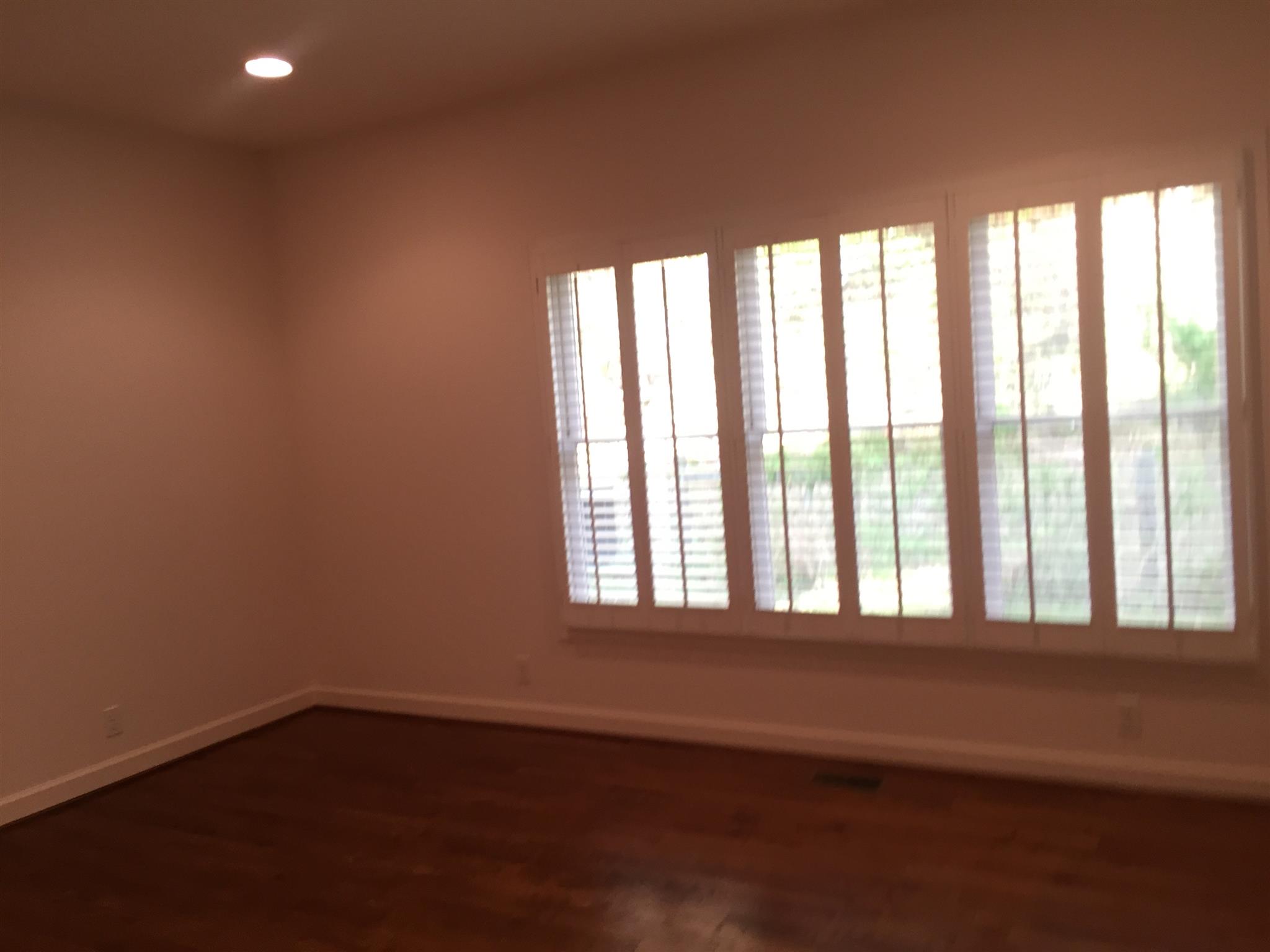 9370 Hester Beasley Road Nashville, TN 37221 - Photo 16 of 22 The Second Bedroom Also Features Hardwood Floors and Plantation Shutters.