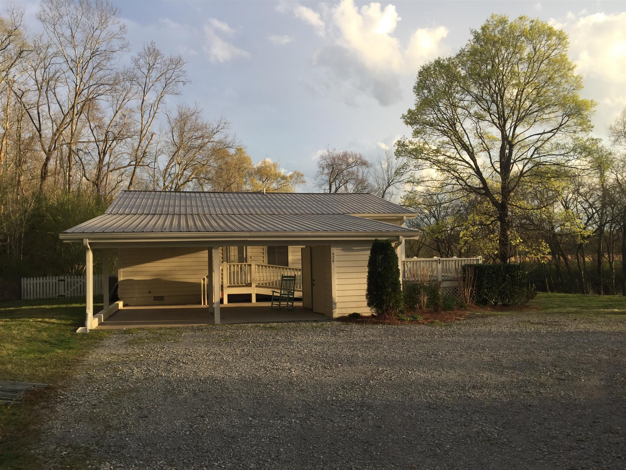 9370 Hester Beasley Road Nashville, TN 37221 - Photo 19 of 22 The Carport Has an Extra Large Storage Closet on the Right.