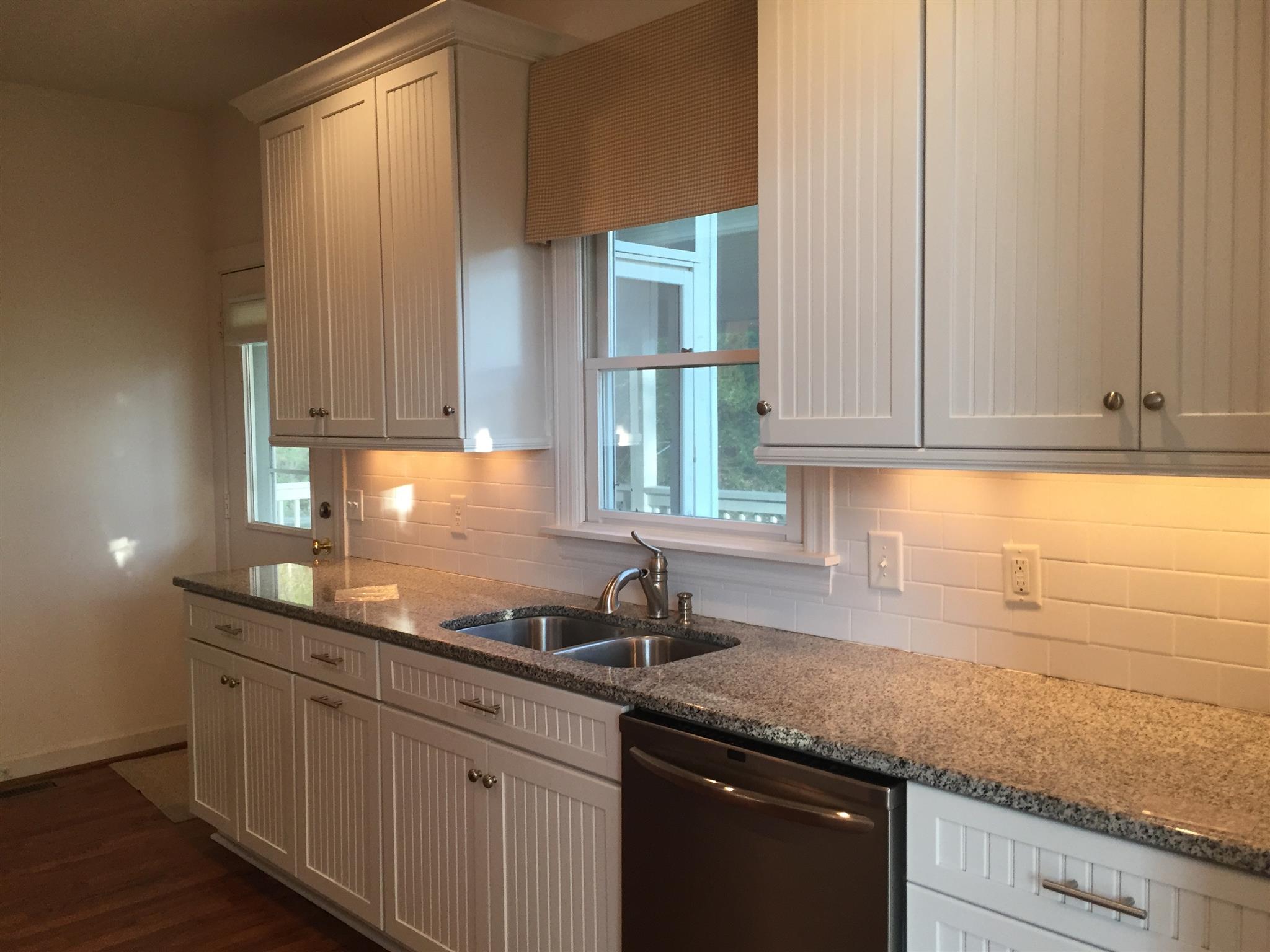 9370 Hester Beasley Road Nashville, TN 37221 - Photo 8 of 22 Watch the Birds Out the Window When you are at the Sink! The Views Everywhere are Beautiful! Cabinets go all the Way to the Ceiling offering Extra Storage.