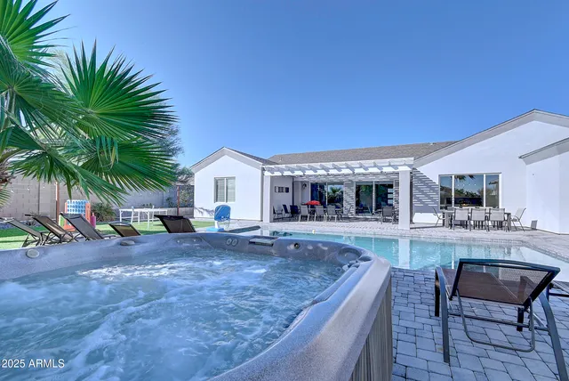 a front view of house with yard and entertaining space