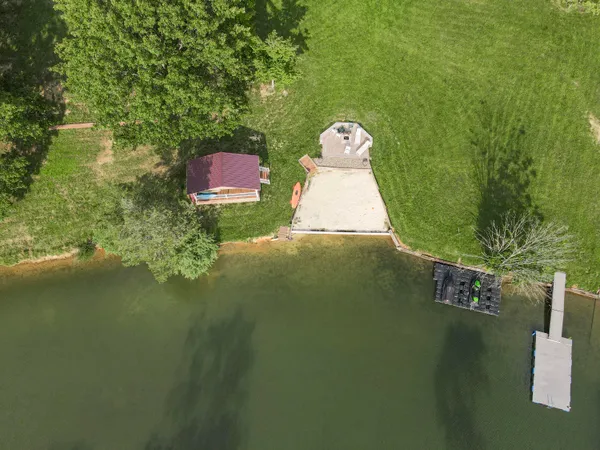 a view of a lake with a yard