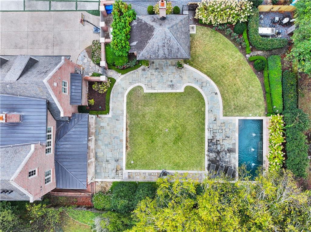 369 Pine Tree Drive Northeast Atlanta, GA 30305 - Photo 97 of 103 an aerial view of a house with a garden
