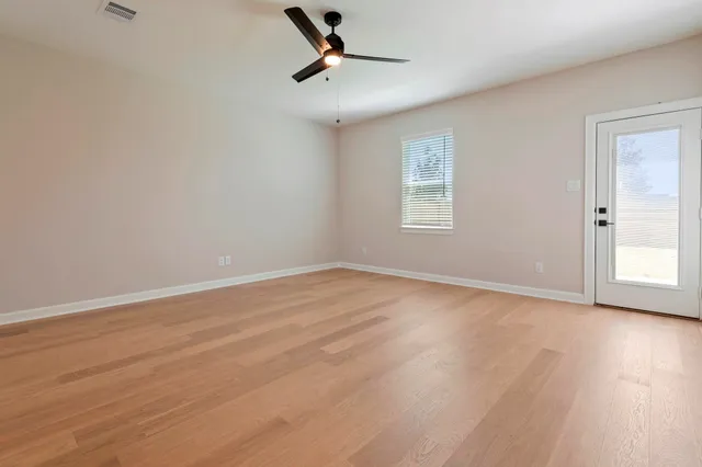 a view of a room with a flat screen tv