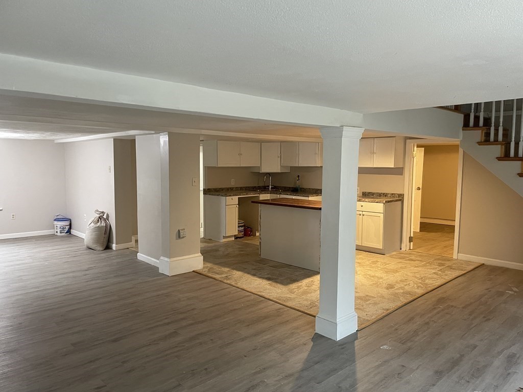 61 King Road Charlton, MA 01507 - Photo 3 of 15 a view of a kitchen with wooden floor and a kitchen