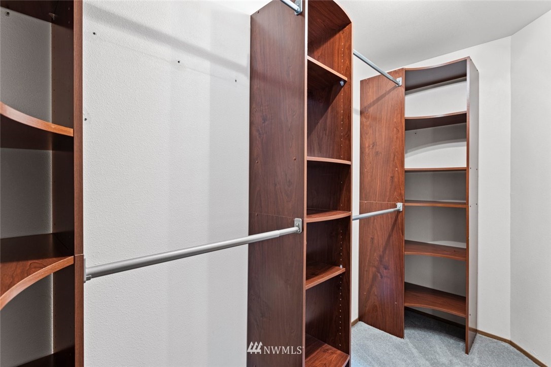 915 215th Street Southeast Bothell, WA 98021 - Photo 21 of 33 a view of walk in closet with empty racks