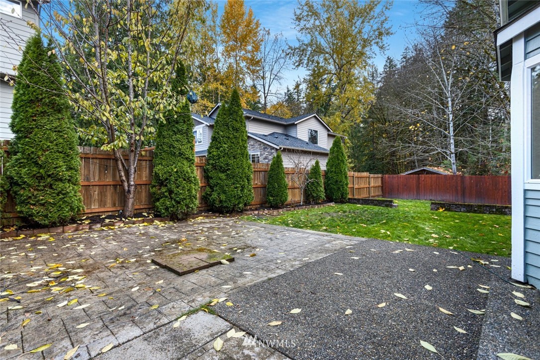 915 215th Street Southeast Bothell, WA 98021 - Photo 29 of 33 a front view of a house with garden