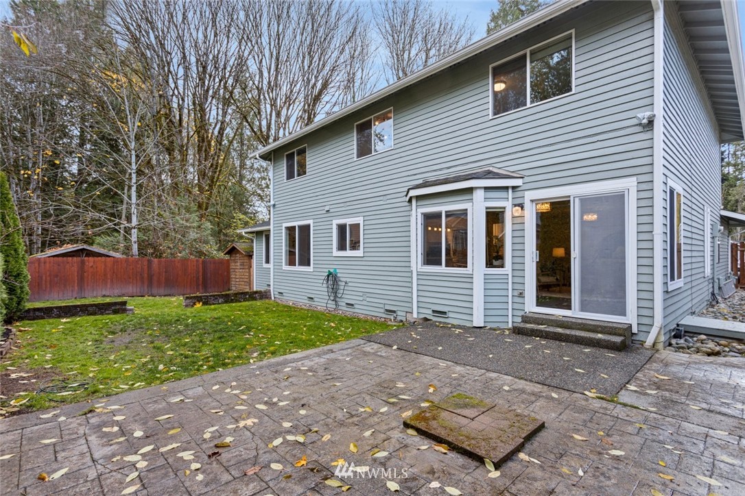 915 215th Street Southeast Bothell, WA 98021 - Photo 30 of 33 a view of a house with a yard