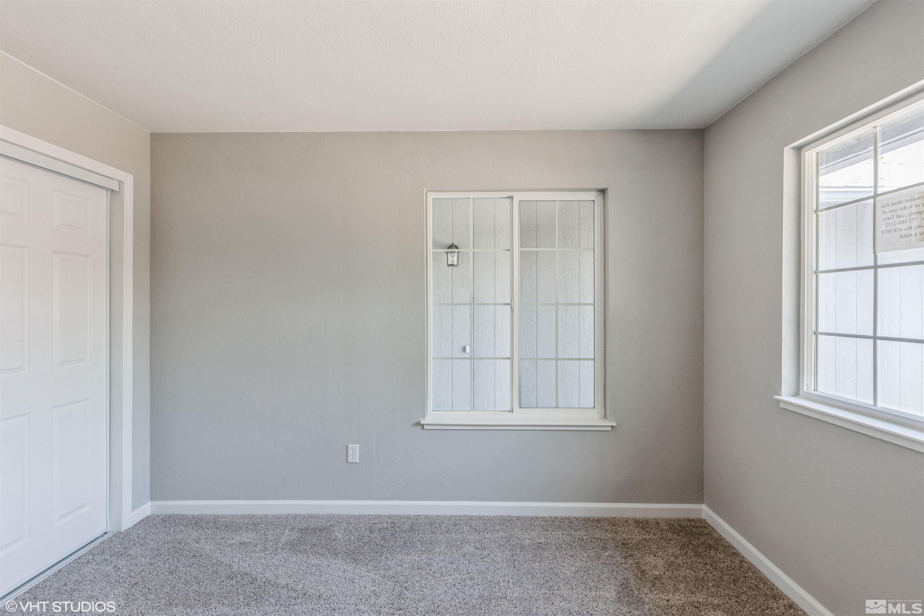 1930 Stardust Street Reno, NV 89503 - Photo 11 of 15 an empty room with windows