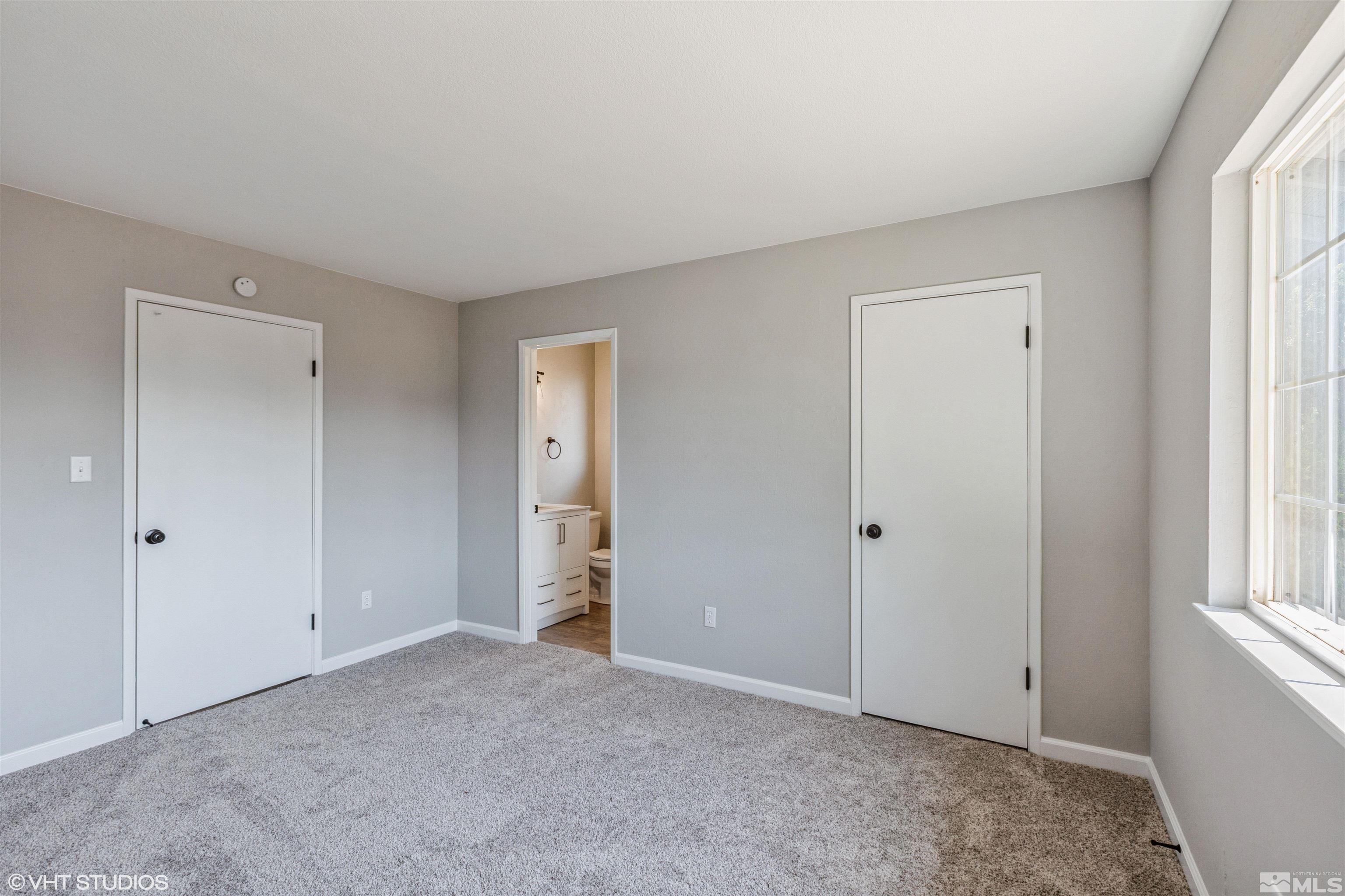 1930 Stardust Street Reno, NV 89503 - Photo 12 of 15 a view of an empty room with a window