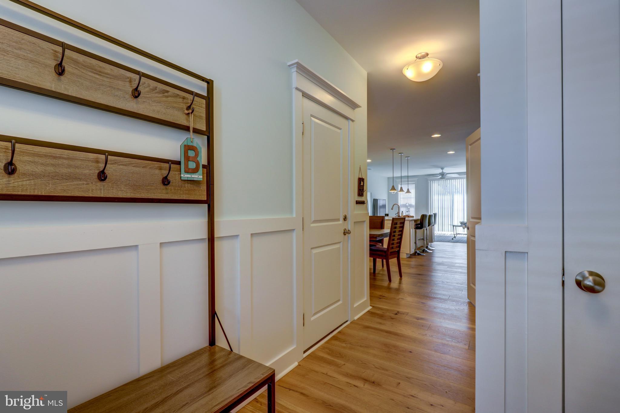 29805 Striper Harbor, Unit C3 Rehoboth Beach, DE 19971 - Photo 33 of 35 a view of dining room with wooden floor