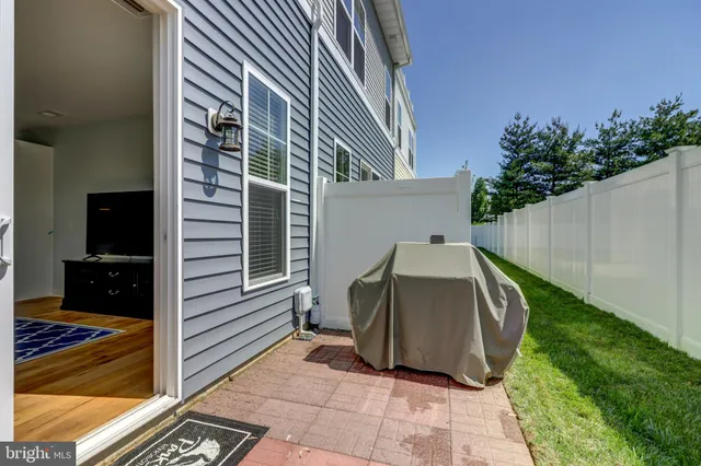 a house view with a backyard space