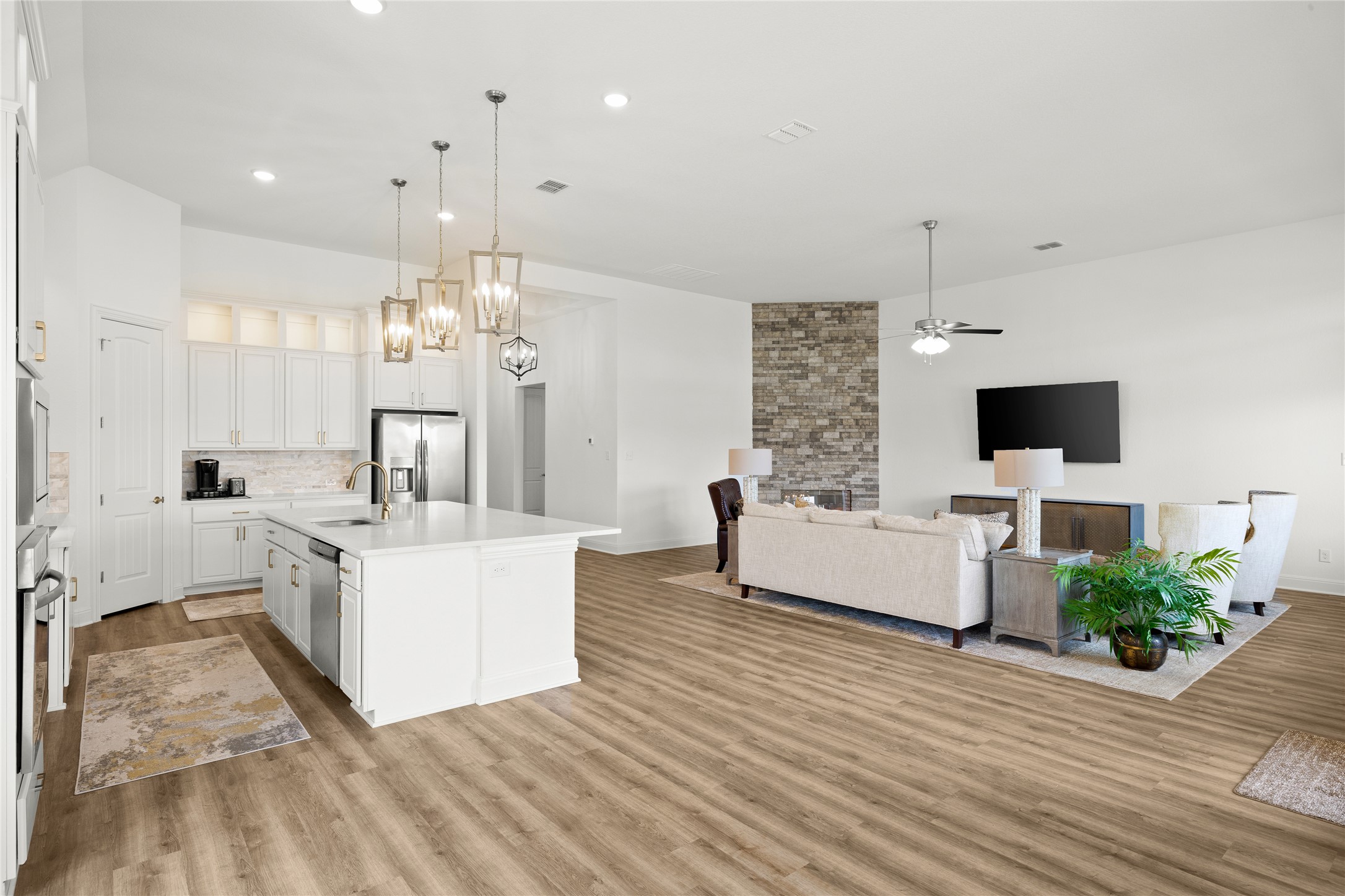 101 Bosco Road Hutto, TX 78634 - Photo 33 of 34 a view of living room with furniture and flat screen tv