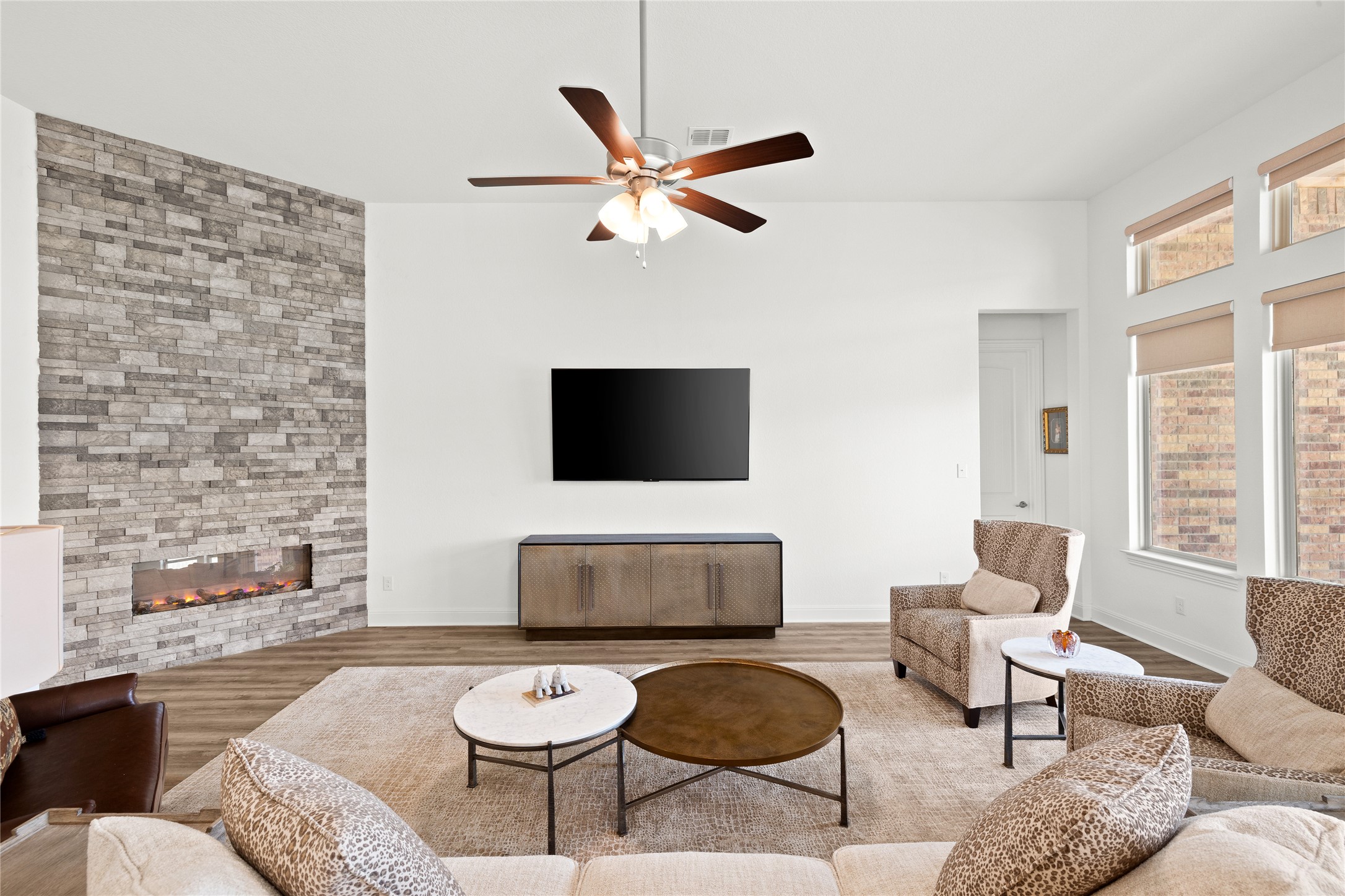 101 Bosco Road Hutto, TX 78634 - Photo 9 of 34 a living room with furniture and a flat screen tv