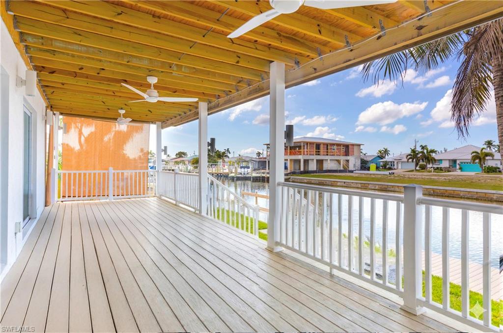 12277 Boat Shell Drive Matlacha Isles, FL 33991 - Photo 42 of 46 a view of a balcony with wooden floor