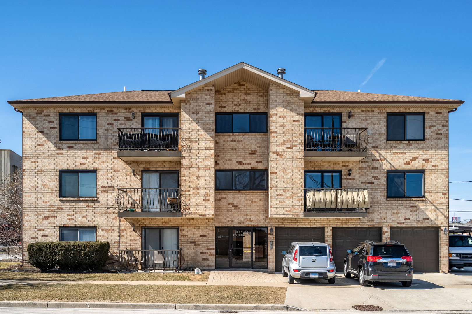 10300 Front Street, Unit 3N Franklin Park, IL 60131 - Photo 1 of 2 a front view of a house with parking space and parking