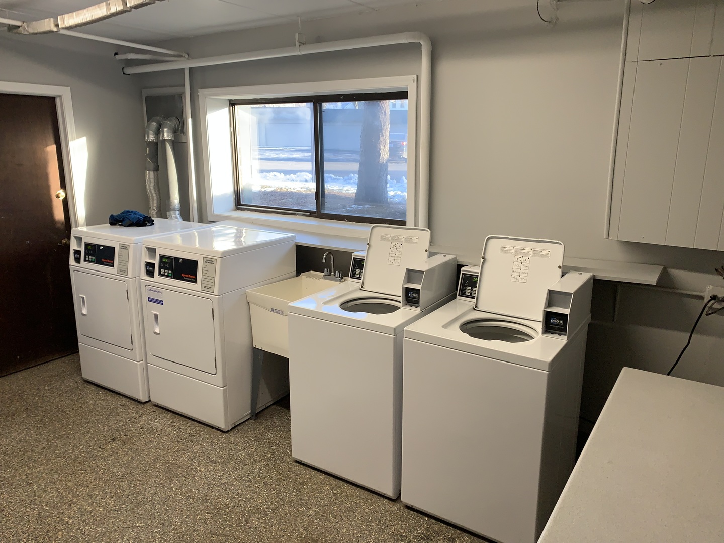 264 East Bailey Road, Unit C Naperville, IL 60565 - Photo 27 of 30 a view of washer and dryer with kitchen in the background