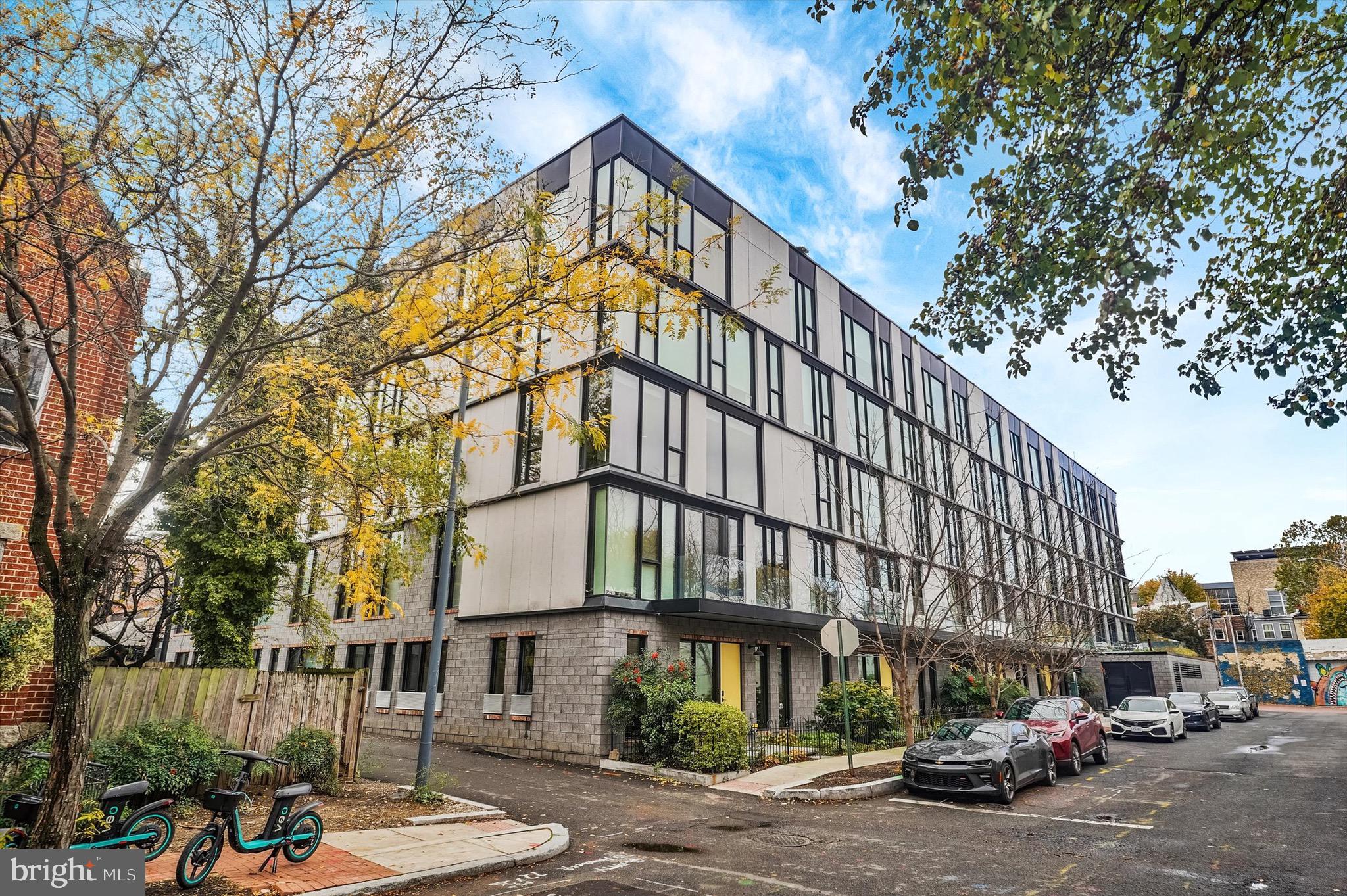 a front view of a building with street view