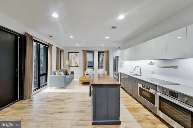 a bedroom with a bed and a view of bedroom