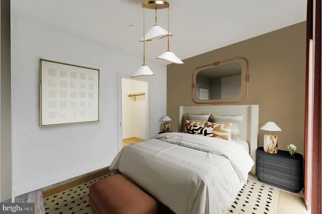 a bathroom with a sink toilet and mirror