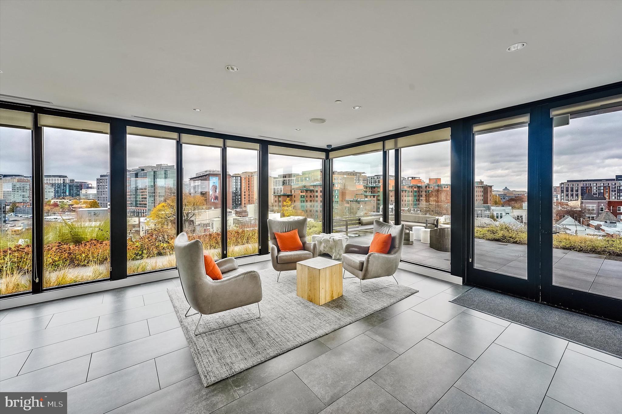 57 N Street Northwest, Unit 125 Washington, DC 20001 - Photo 39 of 56 a living room with furniture and large windows