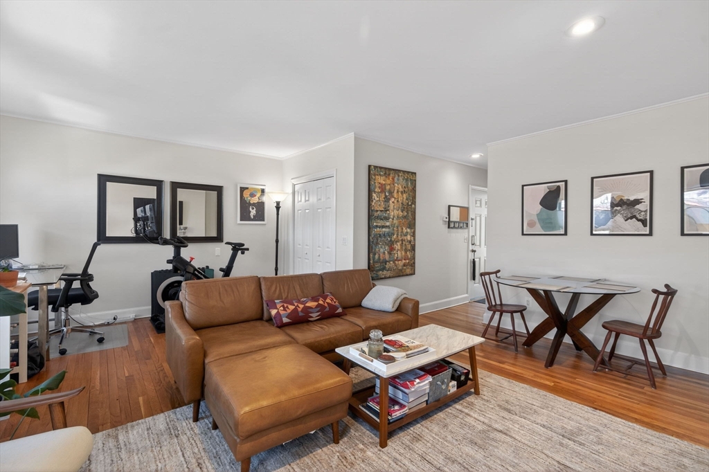 60 Rutland Street, Unit 4 Boston, MA 02118 - Photo 5 of 15 a living room with furniture and wooden floor