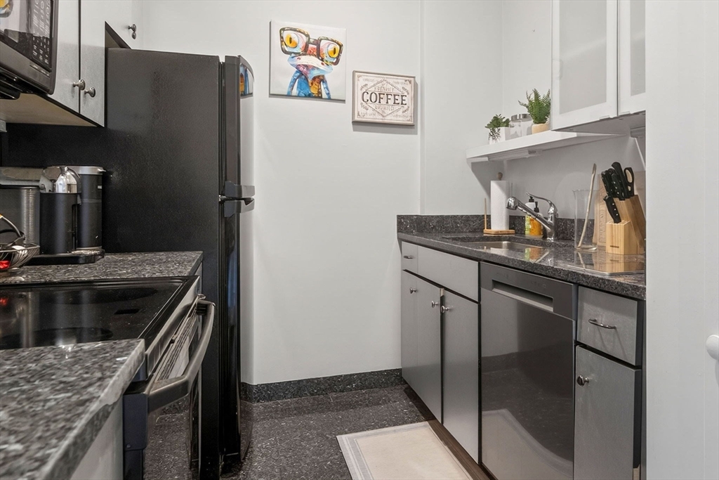 60 Rutland Street, Unit 4 Boston, MA 02118 - Photo 7 of 15 a kitchen with stainless steel appliances granite countertop a refrigerator and a stove