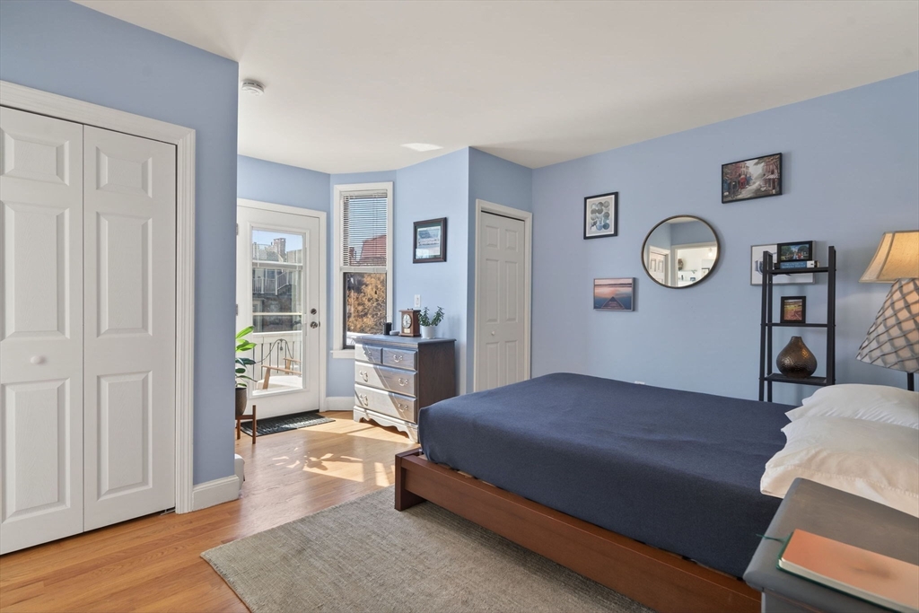 60 Rutland Street, Unit 4 Boston, MA 02118 - Photo 8 of 15 a living room with furniture and wooden floor