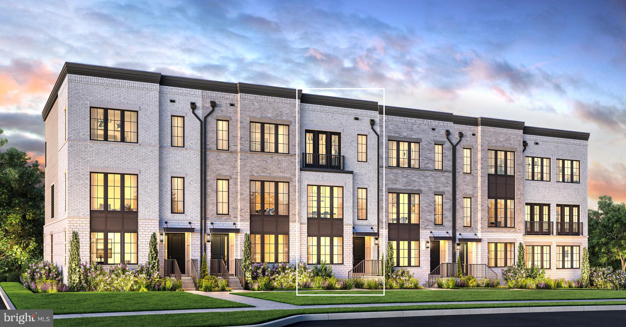 8610 Erdem Place Chevy Chase, MD 20815 - Photo 7 of 21 a front view of a residential apartment building with a yard