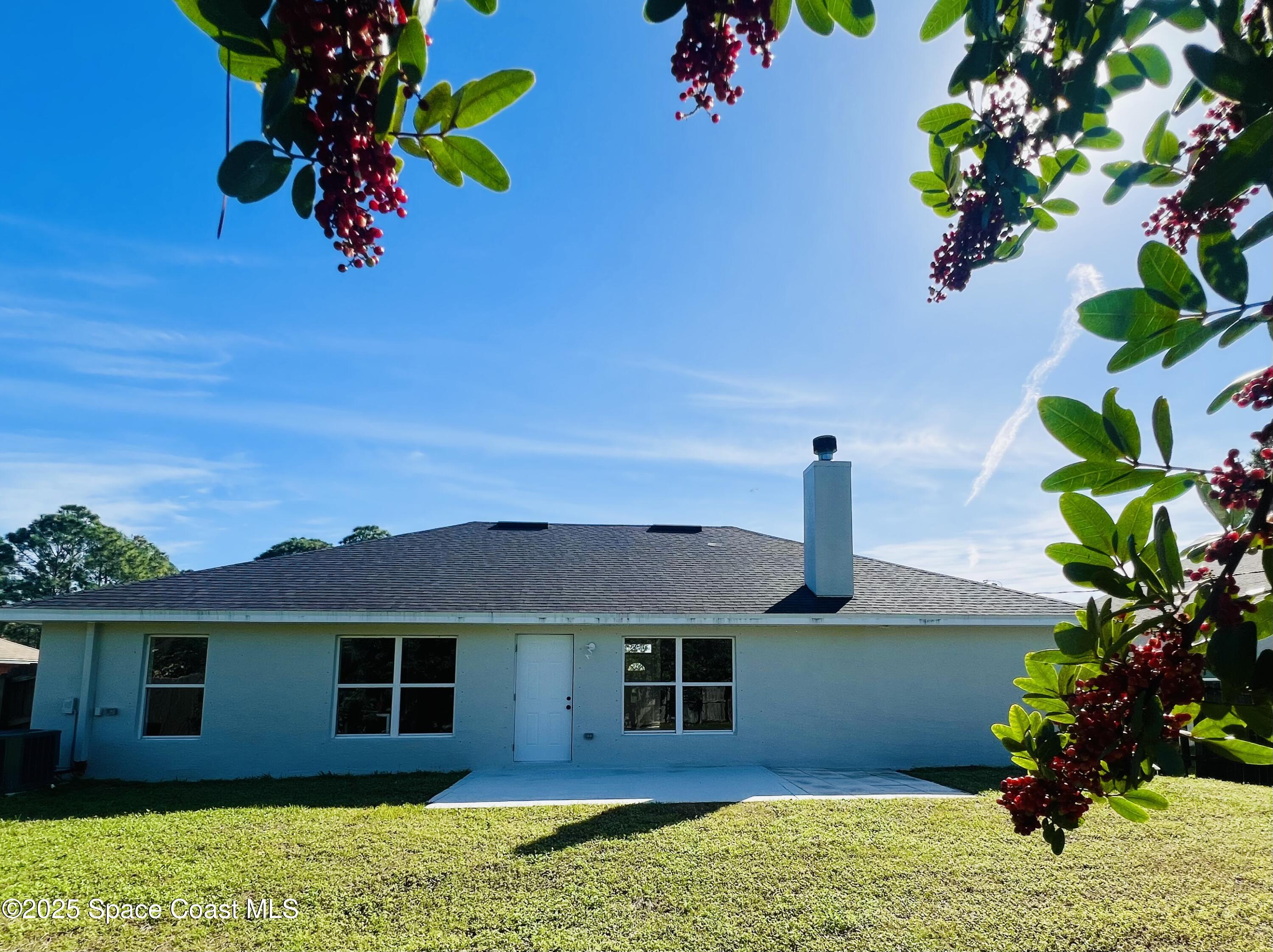 1271 Rabbit Street Southeast Palm Bay, FL 32909 - Photo 3 of 18 IMG_0481_Original