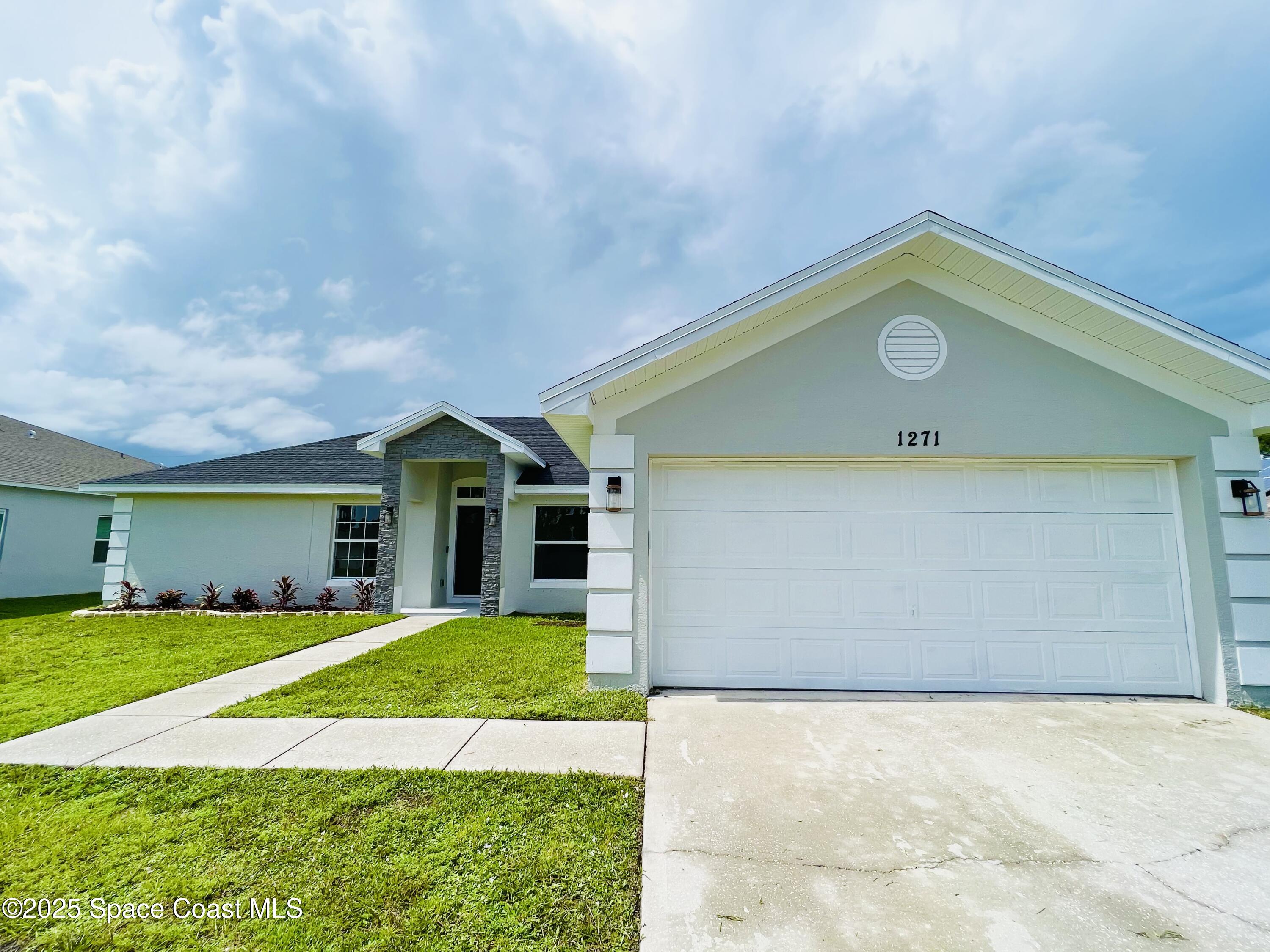1271 Rabbit Street Southeast Palm Bay, FL 32909 - Photo 5 of 18 IMG_9743_Original