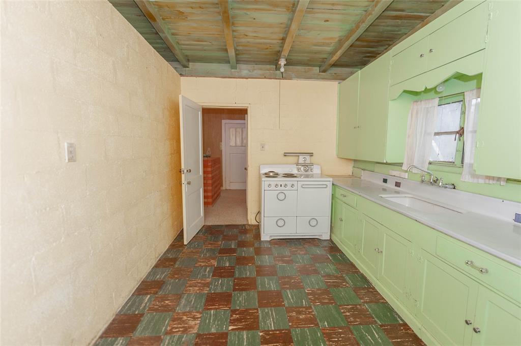 137 Center Loop Whitney, TX 76692 - Photo 23 of 33 a utility room with a wooden floor washer and dryer