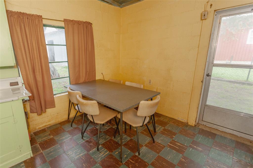 137 Center Loop Whitney, TX 76692 - Photo 25 of 33 a view of a dining room with furniture and a window