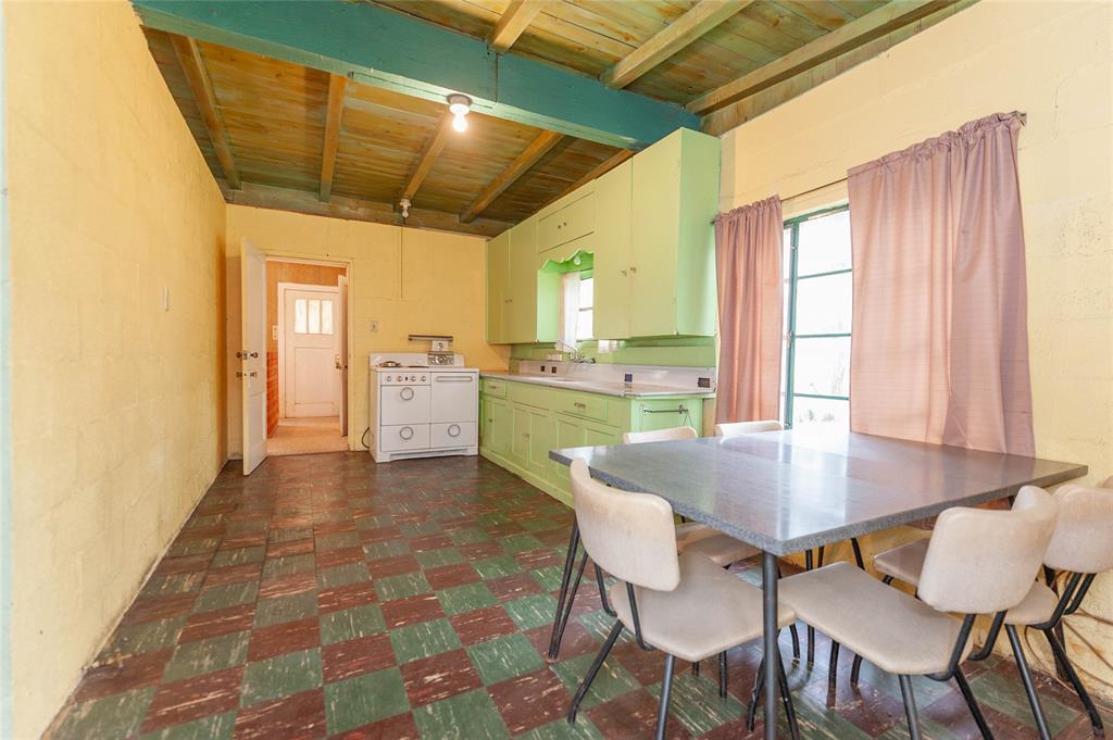 137 Center Loop Whitney, TX 76692 - Photo 27 of 33 a dining room with furniture and window