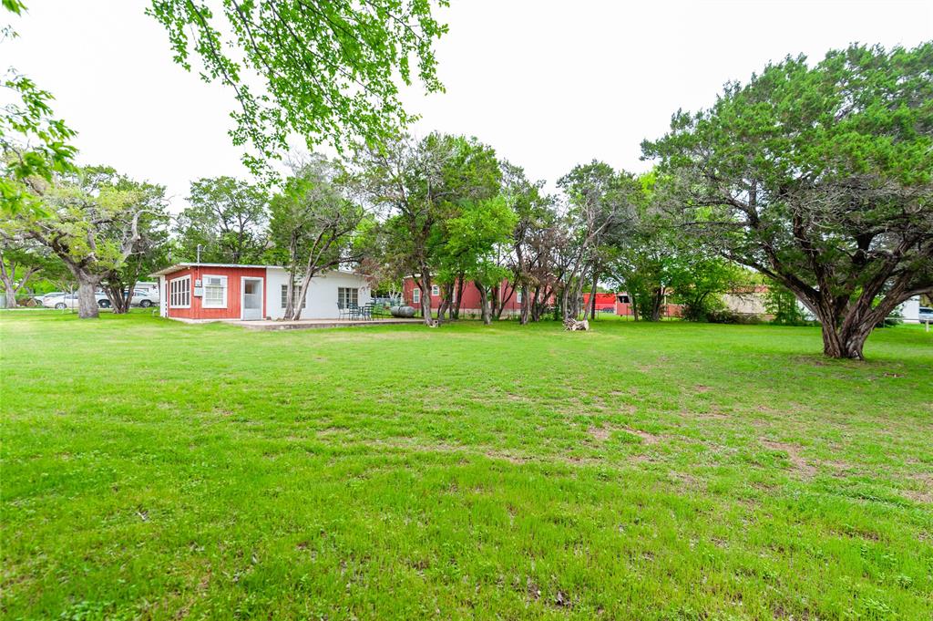 137 Center Loop Whitney, TX 76692 - Photo 10 of 33 a view of a park with large trees
